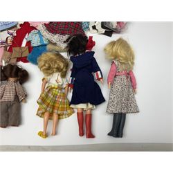 Six fashion dolls by Amanda Jane, Sindy and Barbie with various outfits, clothing and footwear