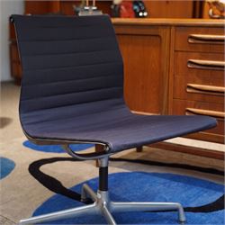 Charles and Ray Eames for Vitra - EA 105 chrome swivel chair upholstered in navy blue, rai...