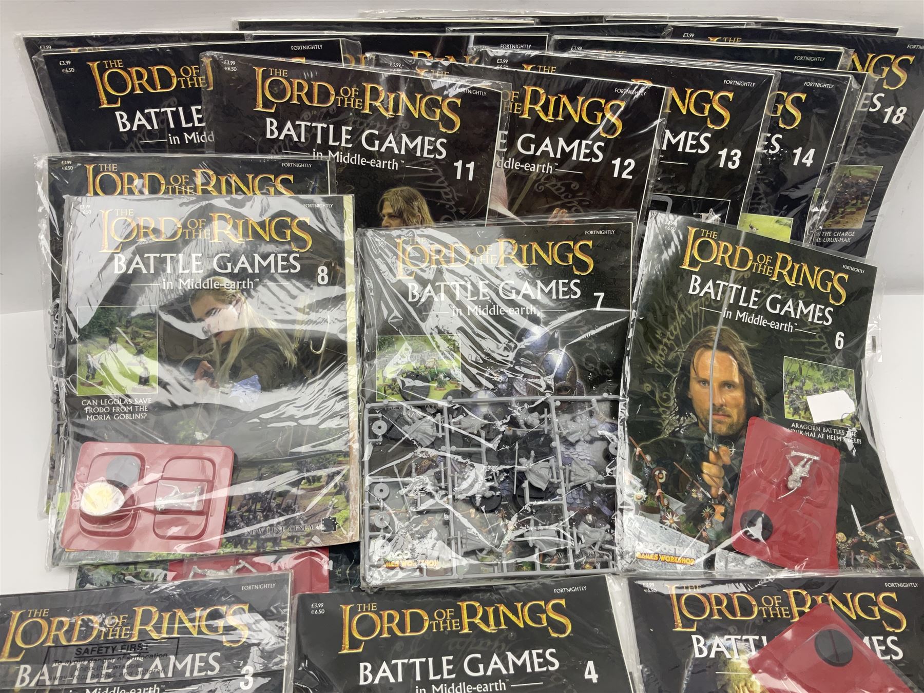 DeAgostini Lord of the Rings Battle Games in Middle-Earth magazines, issues 1 - 28 (lacking no.2), with models, all but one unopened, unbuilt and unpainted (27)