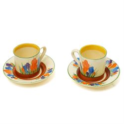 Clarice Cliff Autumn Crocus pattern part coffee service for six, comprising coffee pot and cover, six coffee cups and four saucers, and a milk jug, with Bizarre and printed marks to base, coffee pot H19cm