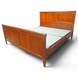 And So To Bed - cherrywood 6' super king 'Nathalie' bed, the panelled headboard and footboard with cylindrical rolled rails, decorative brass mounts to the corners, on square supports with cream and black edged fabric covered base panels 