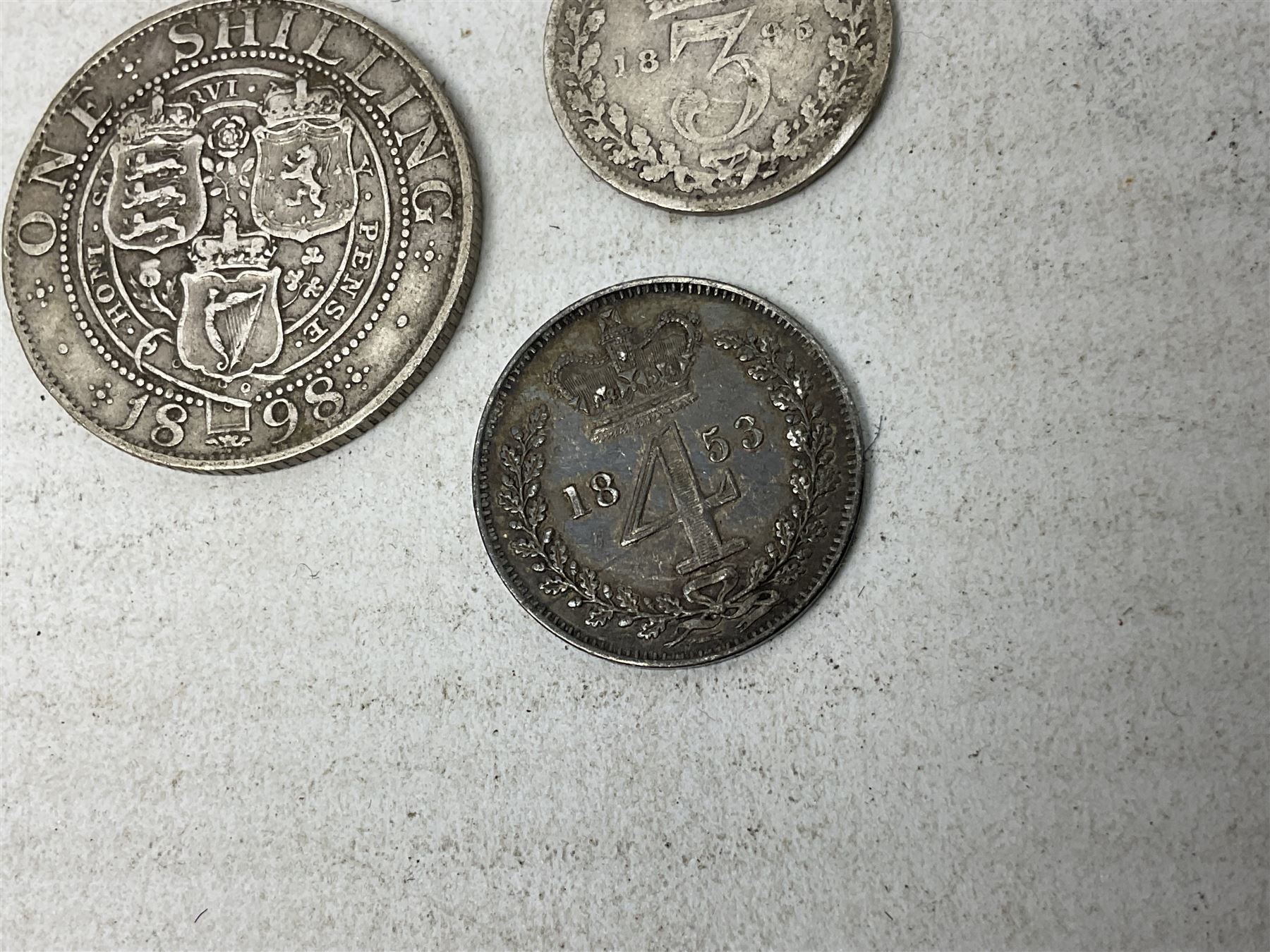 Approximately 120 grams of Great British pre 1920 silver coins, including George III 1819 half crown, William IIII 1834 shilling, Queen Victoria 1892 half crown, various silver threepence pieces etc