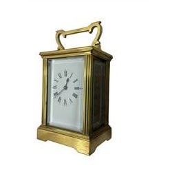 French - 20th century 8-day timepiece carriage clock in a anglaise style case, enamel dial with Roman numerals minute markers and steel spade hands, lever platform escapement with a rectangular viewing glass.