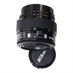 Eight camera lenses, comprising Canon Ultrasonic Zoom EF 75-300mm 1:4-5.6 lens, AF Nikkor 35-70mm 1:3.3-4.5 lens, Nikkor 60-180mm 1:4.5-5.6 lens, Canon Zoom EF 28-80mm 1:3.5-5.6 lens, Canon Zoom EF 80-200mm 1:4.5-5.6 lens, Sigma 70-300mm 1:4.6-5.6 DL Macro, Sigma Zoom 70-210mm 1:4-5.6 UCII lens and a Sigma AF 70-300mm 1:4-5.6 APO Macro lens, all with lens caps