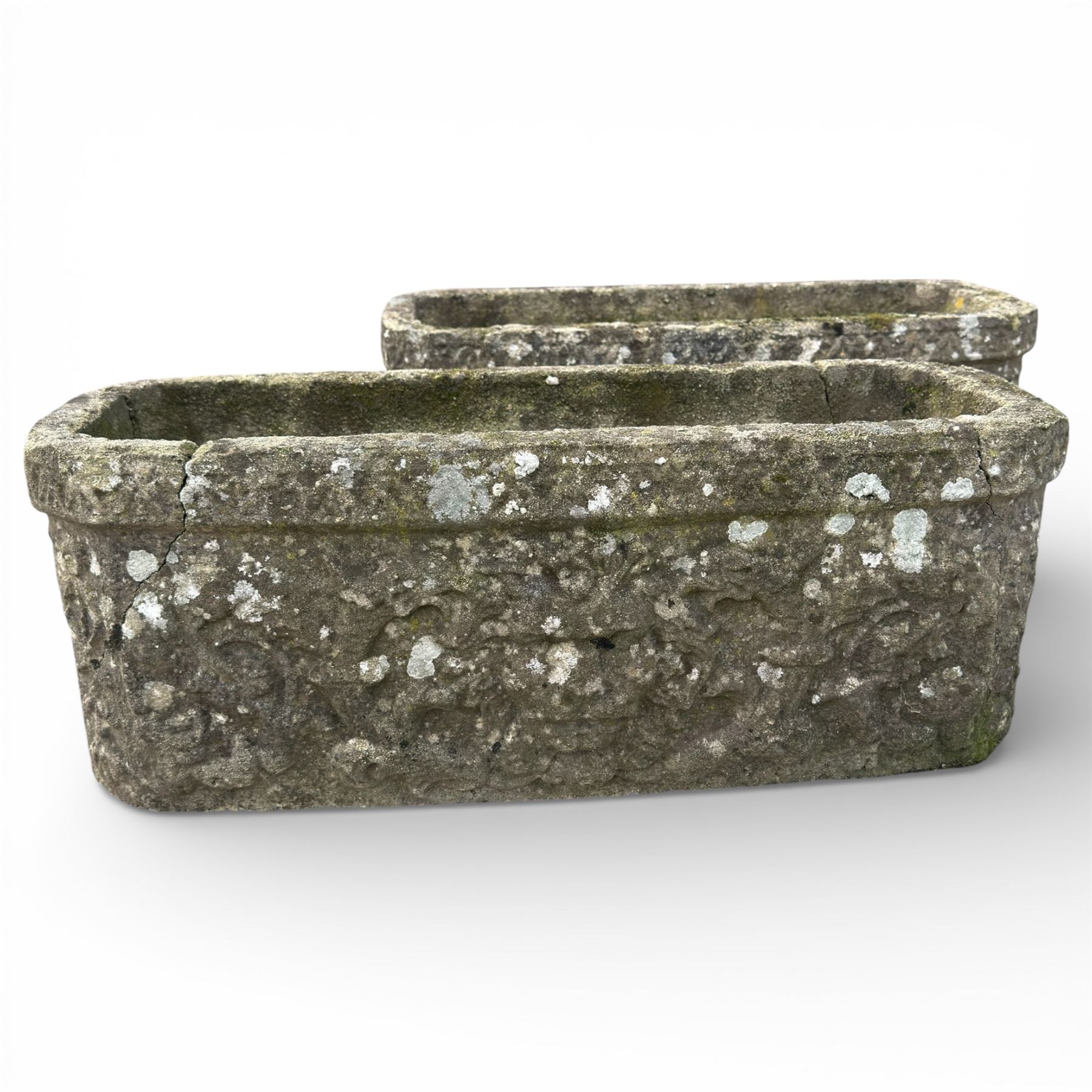 Two cast stone planters / troughs with lion emblems