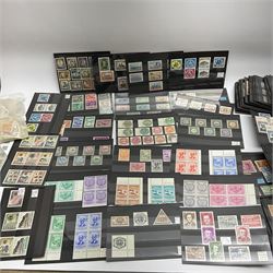 Mint and used stamps on stockcards, many being from Nicaragua, including 1894 'Telegrafos' overprints, 1897 postage due stamps, 1900 'Oficial' stamps including ten centavos, 1961 overprints, miniature sheets etc, housed in four small boxes