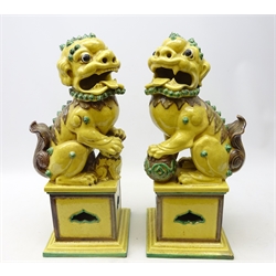  Pair of 20th Century Italian glazed earthenware Dogs of Fo, in the Chinese style, H54cm   