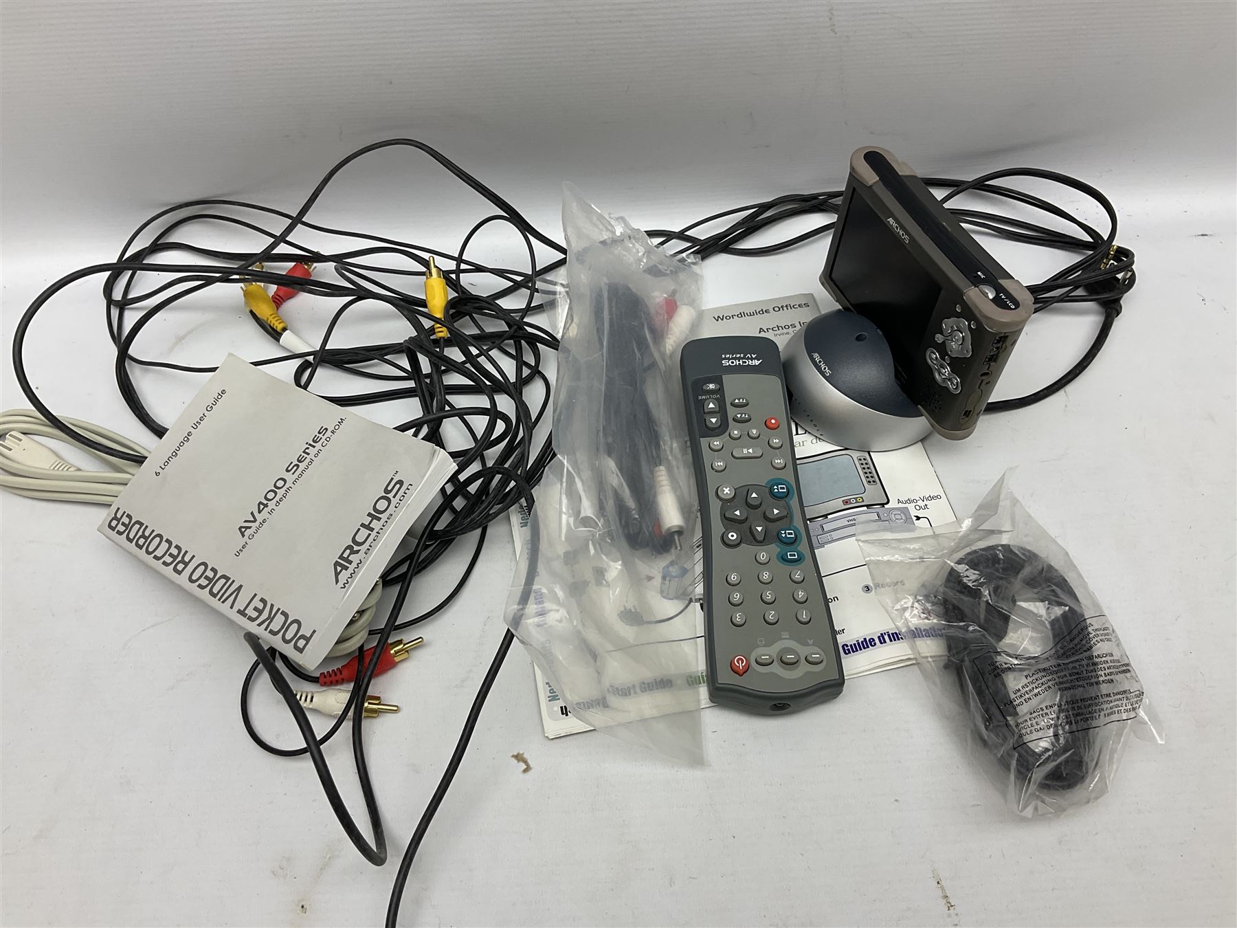 Nintendo Wii console, four controllers with cases and four nunchucks, Wii sensor bar, balance board and dance mat. Guitar hero wireless guitar for Wii and Redoctane wired guitar. Nintendo DS lite handheld gaming console, console and game cases and Guitar Hero Redoctane Guitar Grip. Selection of Nintendo Wii and Nintendo DS lite games to include Super Mario Galaxy, Guitar Hero, Wii Fit, Legend of Zelda games etc. Archos AV400 Series pocket video recorder with accessories, cradle and remote, in three boxes