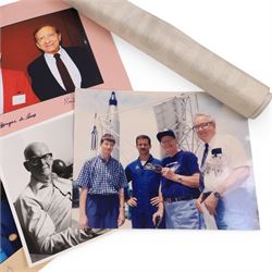 Collection of ephemera relating to Arthur C Clarke, including colour photograph of Arthur with author Joe Green, Jay Kubica and astronaut Chris Hadfield at NASA Kennedy Space Centre, Kennedy Space Centre pennant flag, colour photographs of authors Sam Moskowitz with Forrest Ackerman and L. Sprague de Camp with Robert Bloch, all signed below by the authors, a black and white photograph of Arthur for his 13-Part ITV series 'Arthur C Clarke's Mysterious World', Pan Books cardboard advertisement for Rendezvous with Rama and an Evening Standard poster for The Other Side of the Sky

Notes: This item is from the private collection of Arthur C. Clarke's brother.