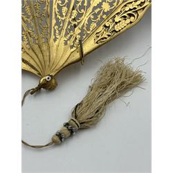 19th century carved gilt wood fan by Eugene Rimmel, the guards and sticks with pierced floral decoration, the chiffon leaf worked with sequins, with silk beaded tassel, stamped E.Rimmel 36 Strand London, with a purple silk lined box 