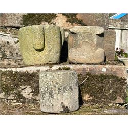 Matched pair of carved stone mortars, together with a Roman stone flambard douser of octag...