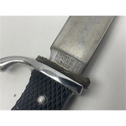 Post WWII scout knife, based on a Hitler Youth knife, in embossed leather sheath with scout emblem to handle, together with a similar example, also with scout emblem to handle, marked Whitby made in Germany, and a hunting knife with serrated edge, largest L39cm
