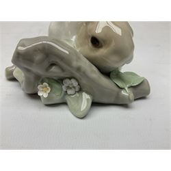 Six Lladro figures, comprising Naughty Dog no 4982, Best Friend 7620 and My Buddy no 7609, Kitty Confrontation no 1442, It Wasn't Me no 7672 and Rabbit Eating no 4772, three with original boxes, largest example H22cm