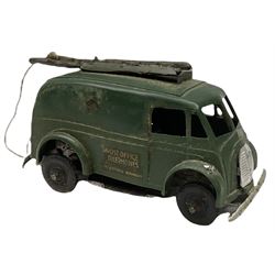 Eight Tri-ang Minic tin-plate/plastic clockwork vehicles comprising Tipper Lorry, Post Office Telephones Van, Caterpillar Tractor, Evening News Van, two Royal Mail Vans, American jeep and saloon car; all unboxed (8)