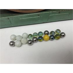 1934 Lindstrom's 'Airways' tin-plate bagatelle game by Lindstrom Tool and Toy Company Bridgeport Conn., the decorative bagatelle board depicting Lindstrom's epic airway routes; with wooden peg and quantity of balls H61cm