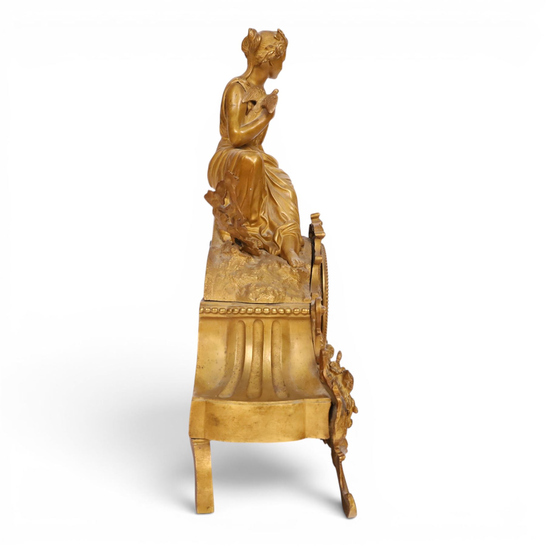 19th century French ormolu mantel clock, retailed by J & W Marshall, Paris, surmounted with a figure of in neo classical dress, with enamelled Roman dial marked James & Walter Marshall, H39cm 