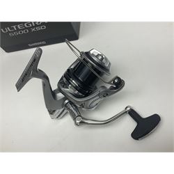 Four fixed spool reels, all in original boxes, comprising Shimano Ultegra 5500 XSD, with spare spool, Mitchell Autosurf 700, with spare spool, Shimano Sedona 600 FB with spare spool and D.A.M Quick 5001