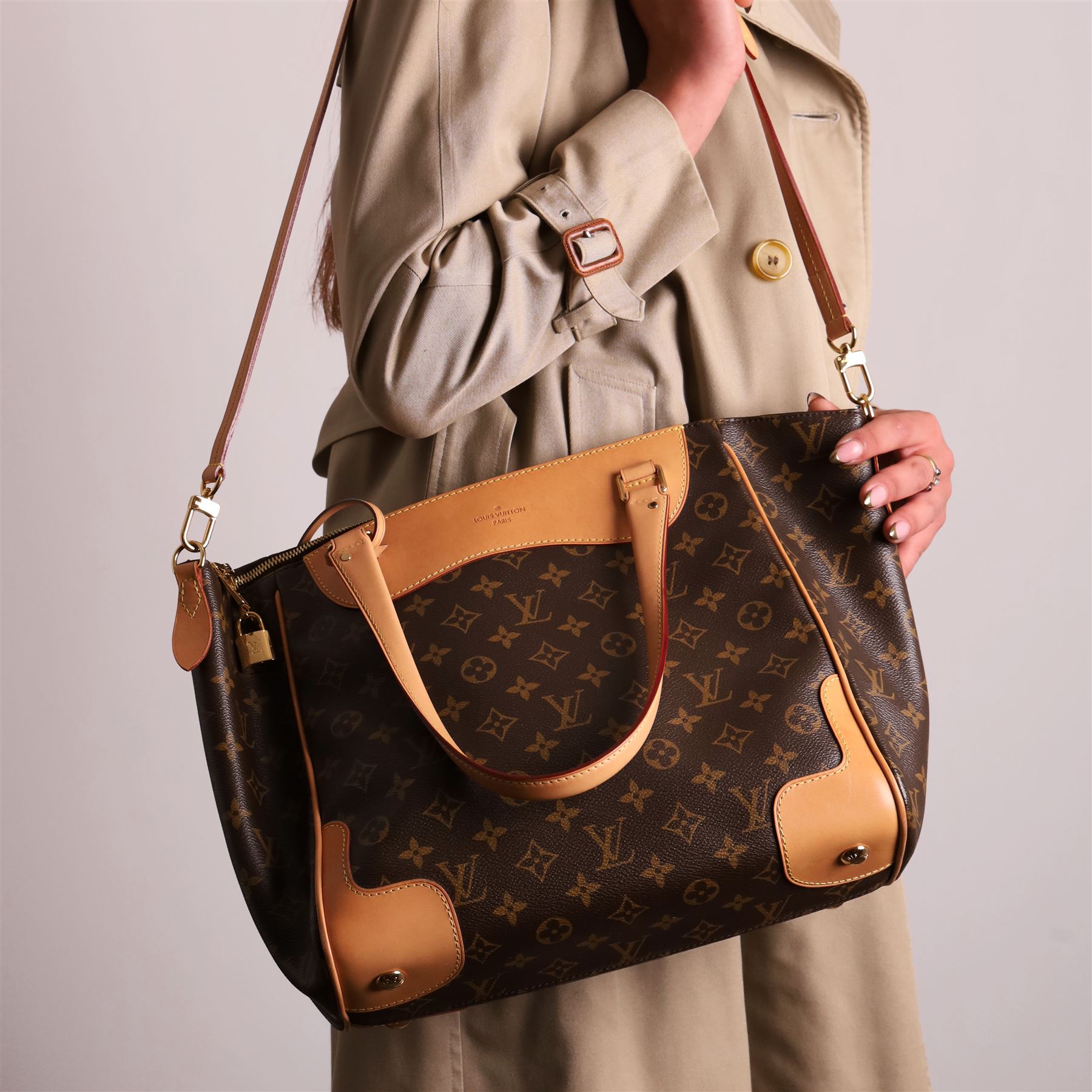 Louis Vuitton - ‘Estrela’ MM NM Tote Bag, circa 2015, in signature monogram coated canvas with natural Vachetta leather trim, with twin top handles and detachable shoulder or crossbody strap over expandable sides, the interior in burgundy suede with pocket divisions, base width 32cm, with original dust bag