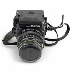 Zenza Bronica ETRS medium format camera, serial no. 8301079, with Zenza Bronica Zenzanon EII 1:2.8 f=75mm lens with lens cap, serial no. 7955198 and two film backs and instruction booklet