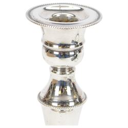 Pair of late 20th century silver mounted candlesticks, of tapering form with beaded rims, hallmarked Cooper Brothers & Sons Ltd, Sheffield 1972, H20cm