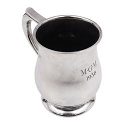 1930s silver tankard, of baluster form, with personalised engraving and C scroll handle, upon spreading circular foot, hallmarked Mappin & Webb Ltd, Sheffield 1938