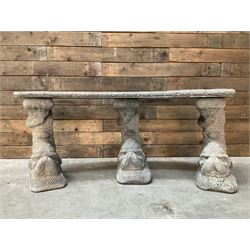 Cast stone four piece curved Dolphin bench, set with three dolphin pillars, curved rectangular slab top with detailed border
