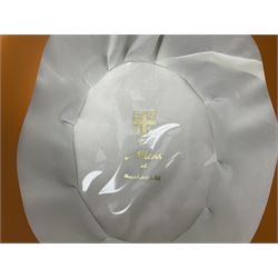 Leather hat box containing black felt top hat with 'British Manufacture' label, together with a grey top hat with 'Allens of Harrogate' label 