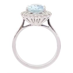 18ct white gold oval cut aquamarine and round brilliant cut diamond cluster ring, hallmarked, aquamarine approx 2.05 carat