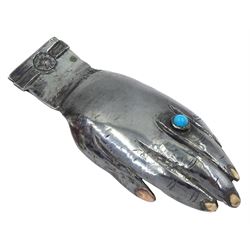 Modern Guild of Hull Silversmiths oxidised silver caddy spoon, modelled as an outstretched hand with engraved wristwatch to wrist and inset turquoise cabochon to finger, hallmarked Charles Richard Berkin of Beverley, London 1987, also marked with the three crowns mark of the Guild of Hull Silversmiths, L 8.7cm, approximate weight 0.89 ozt (27.9 grams)

Abraham Barachin was the last Hull silversmith to use the Hull mark of three ducal coronets in around 1706. 
However in 1983 the Assay Offices of Great Britain and the City of Kingston upon Hull granted the Guild of Hull Silversmiths permission to use the City's Coat of Arms as an additional mark on pieces they produced. 