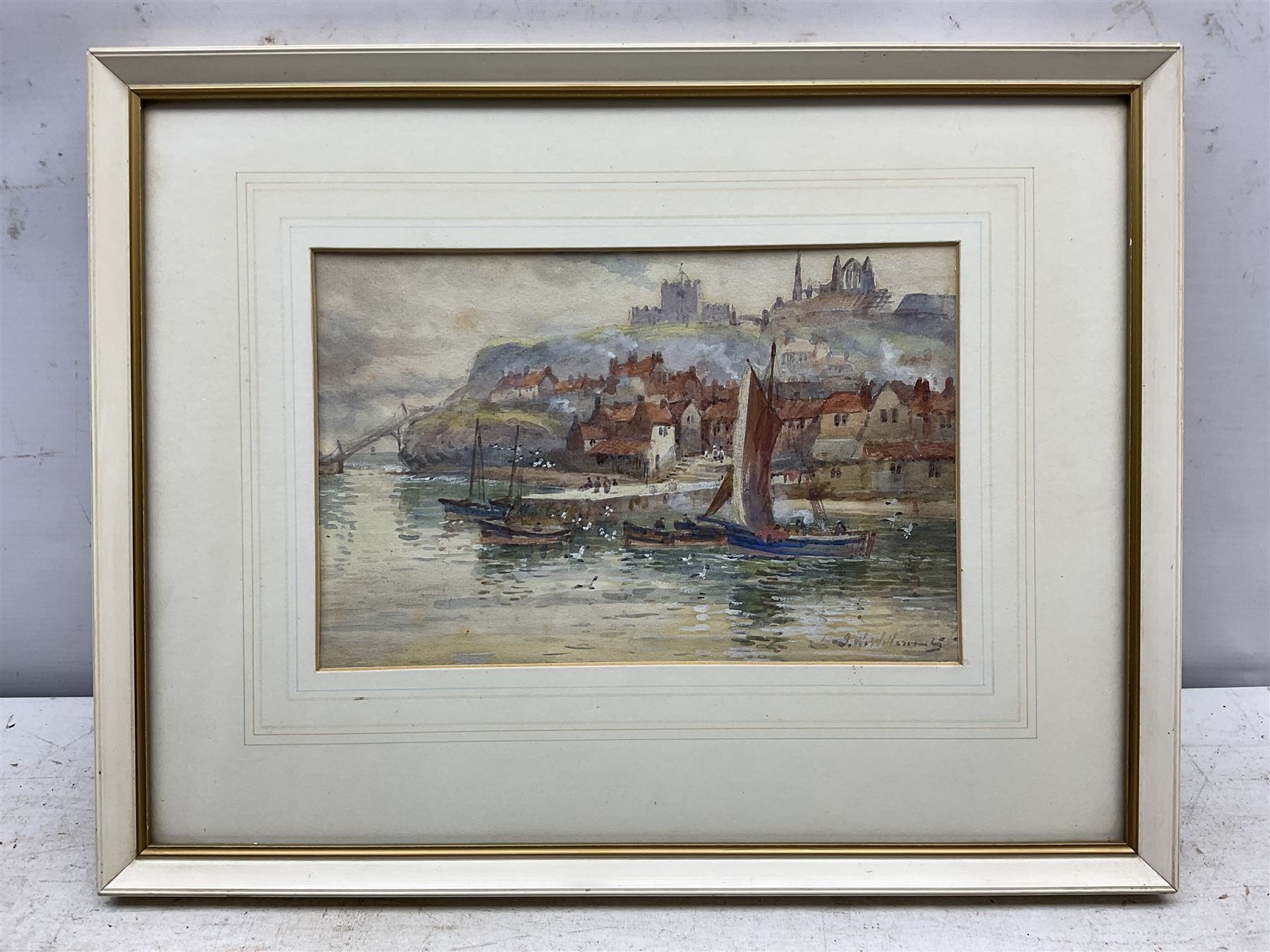 John Wynne Williams (British fl.1900-1920): Boats at Tate Hill Pier Whitby, with the Spa Ladder in the background, watercolour signed 16cm x 25cm