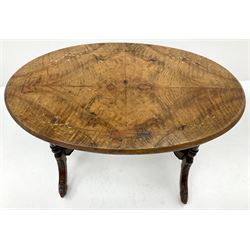 Victorian inlaid walnut oval stretcher table, turned columns on carved shaped supports
