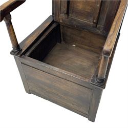 18th century elm box-seat lambing chair, dished cresting rail over panelled back, panelled hinged lid flanked by two turned arm supports