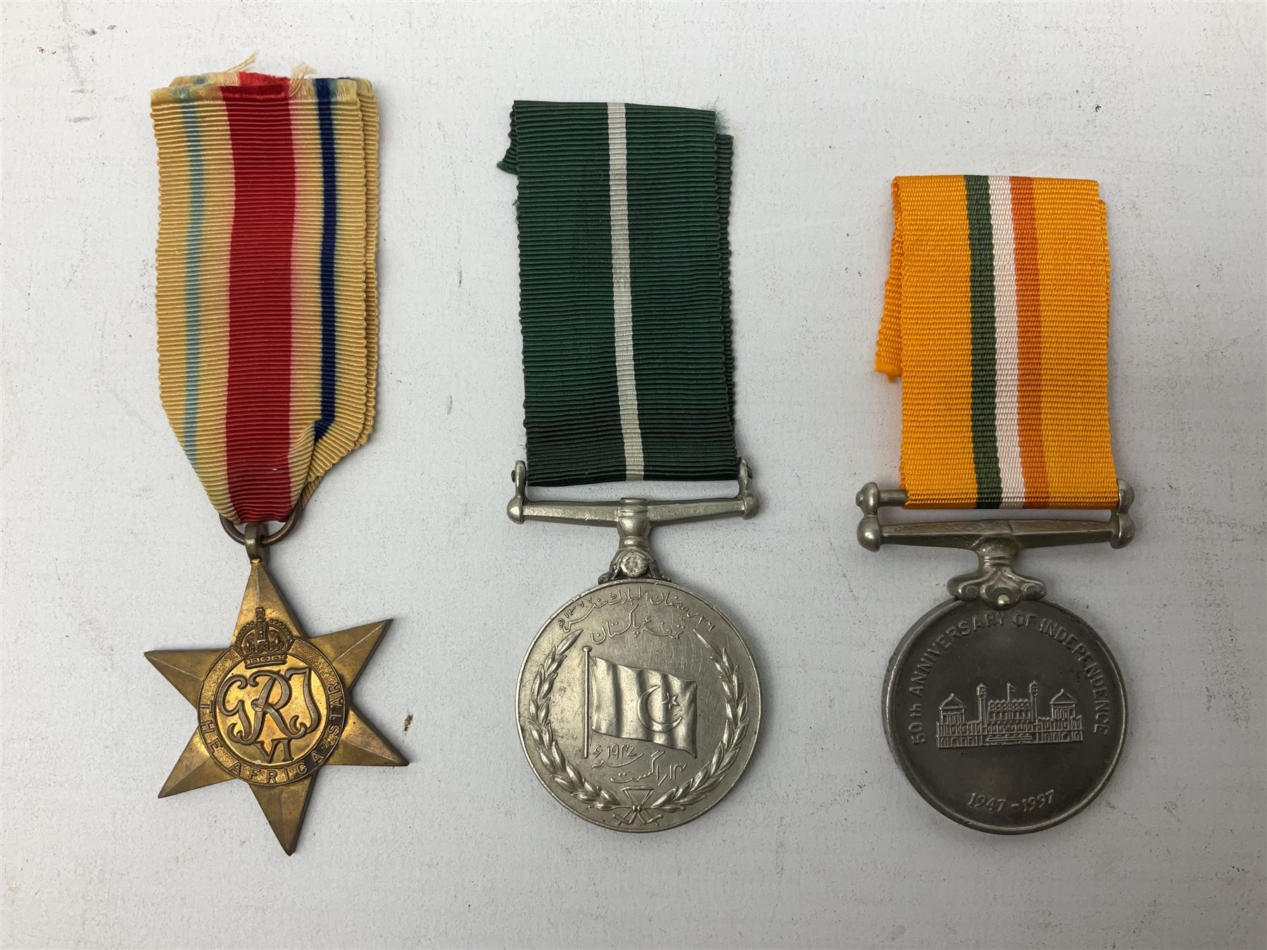 QEII General Service Medal awarded to 23504634 CFN. R.G. Beech REME; Pakistan Independence Medal awarded to Nadir Khan F.C.330; India Independence 50th anniversary medal; and a quantity of WW2 and later medals including Territorial Efficiency Medal awarded to 6196646 Gnr. J.G. Oatway R.A. (13)