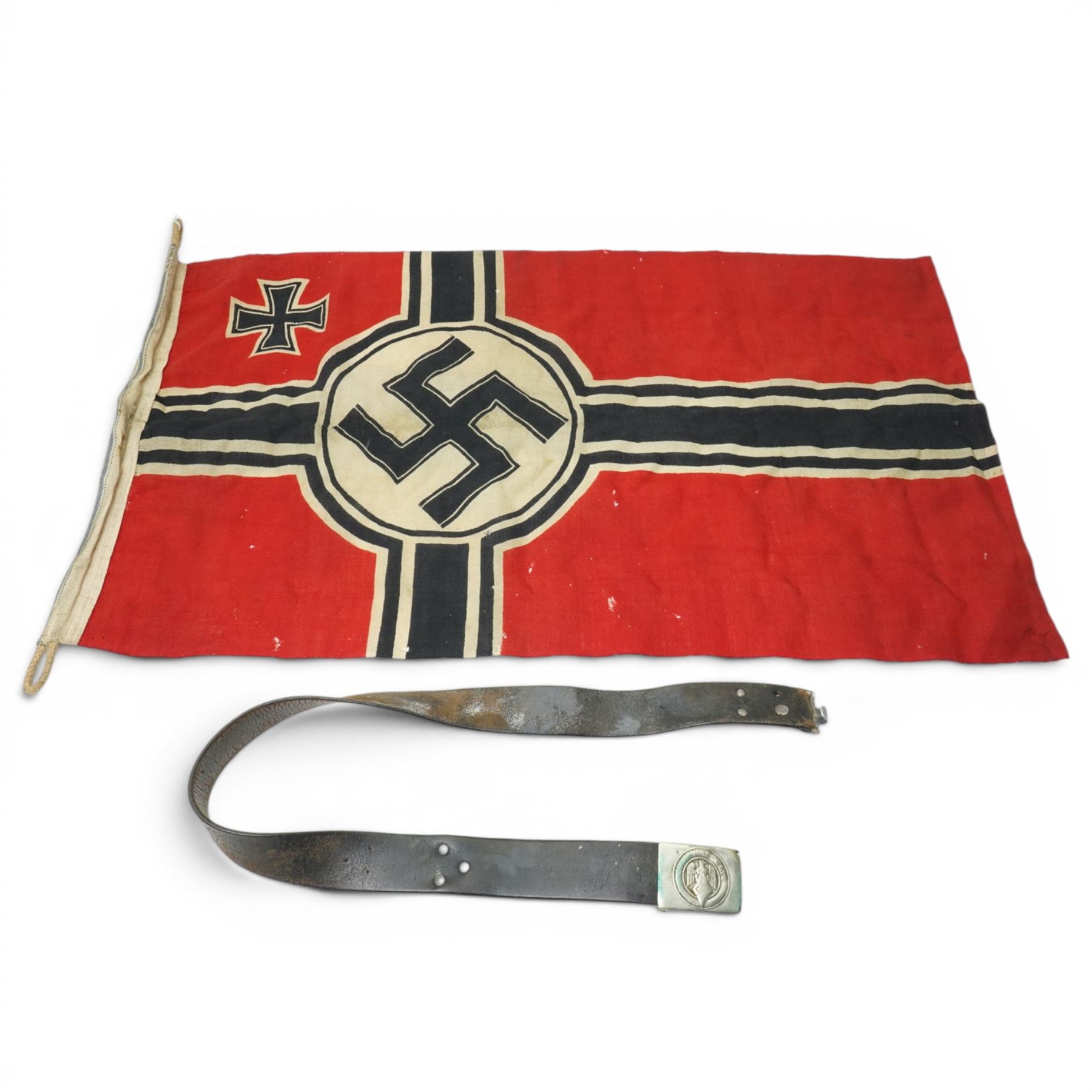 World War II German Kriegsmarine flag 49cm x 80cm and a Hitler Youth leather belt, the leather marked A Gr 25 (2)