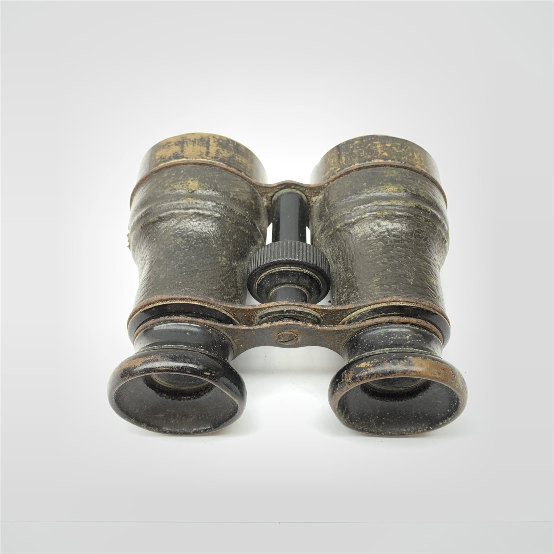 Caricature wooden carving of two WW2 British officers, inscribed under the base 'Venice March 1946' H13cm; and unmarked pair of binoculars (2)