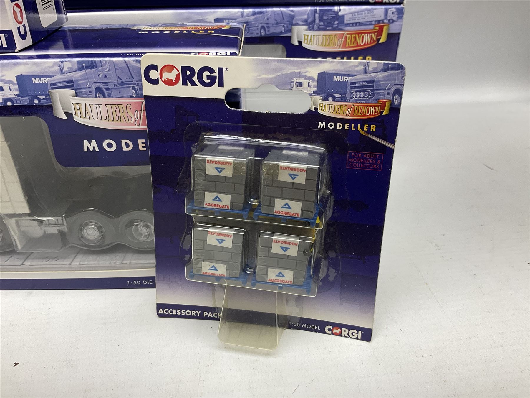 Corgi - limited edition Cafe Connection Albion Reiver Sheeted Platform lorry W.H. Malcolm Ltd Jungle Cafe No.CC11603; and seven Hauliers of Renown Modeller Series vehicles CC19910, 19911, 19912, 19913, 14100, 14000 & 13700 all boxed; together with two Modeller Accessory packs (10)