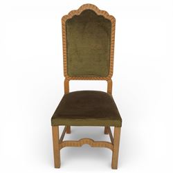 20th century set of eight dining chairs, high back form with shaped and scalloped back rails enclosing upholstered panels, matching upholstered seats, on square legs with shaped apron stretchers