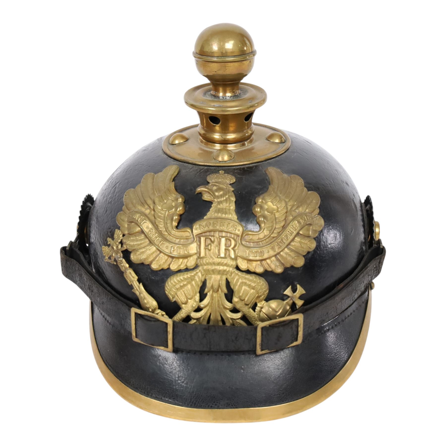 WWI Prussian EM M1895 artillery Pickelhaube, circa 1895, the black leather skull with brass ball finial, brass eagle helmet plate and leather chin strap, one side with a black cockade, the other black and red
