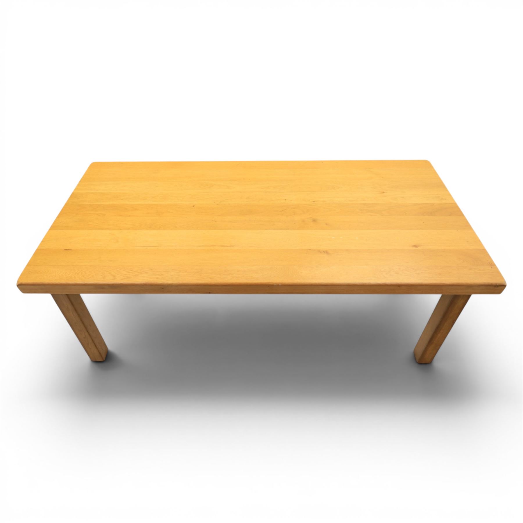 Contemporary solid oak dining table, and set of eight chairs, rectangular plank top with chamfered edges, raised on square supports
