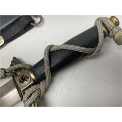 German Paul Weyersberg & Co Solingen DLV flyers dagger with 18cm steel blade, plated brass/tombac downswept cross-piece and pommel and leather covered grip, in leather and plated brass/tombac scabbard with leather hanger strap and silvered knot L35cm overall. Auctioneer's Note: After WWI Germany was forbidden an air force by the Treaty of Versailles however the Deutscher Luftsport-Verband (German Air-sport Association) was formed in March 1933 from various sports flying clubs and had branches for aeroplane, gliding and balloon flying. Under cover of the sporting DLV, many future Luftwaffe pilots trained to fly. DLV was embodied with the NSKK in March 1935 and on 1st March 1937 Luftwaffe was formed.