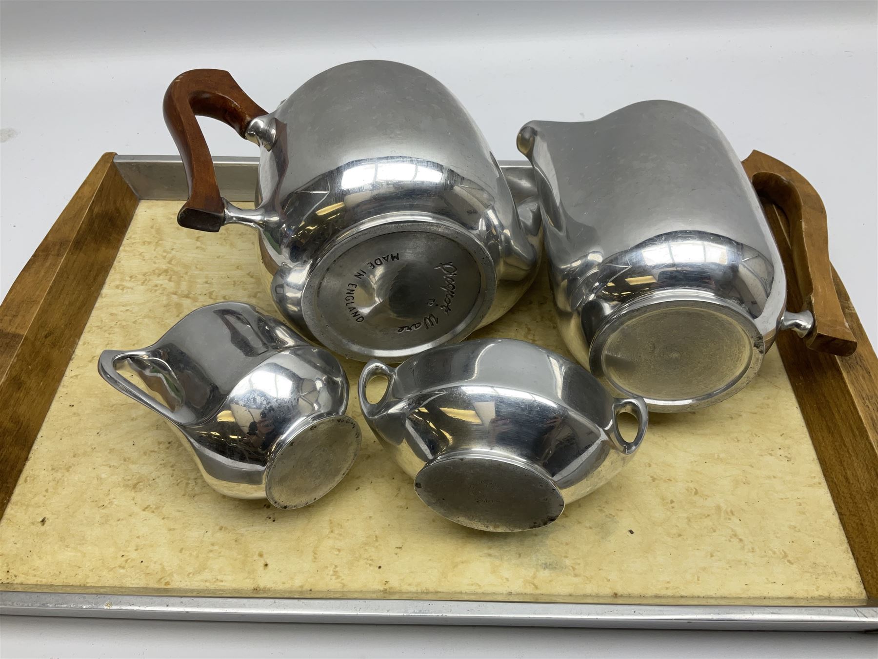 Picquot ware four piece tea set and tray
