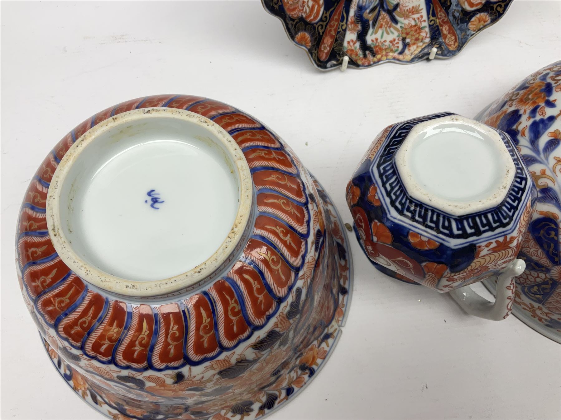 Two Japanese Imari bowls, together with Imari dish with scalloped edge and jug, largest bowl, H12cm