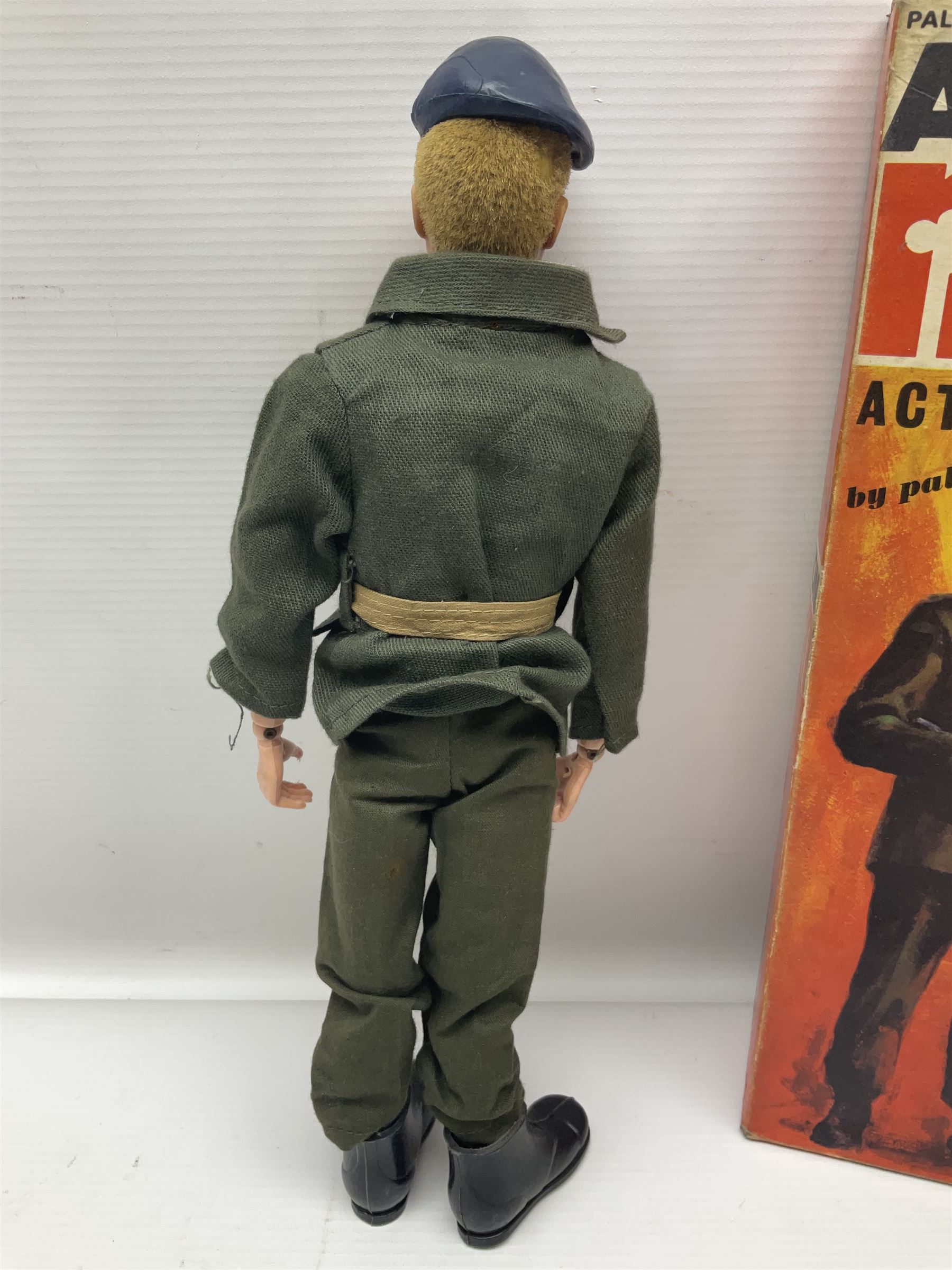 Palitoy Action Man Action Soldier No.34014 with tunic, belt, trousers, boots, blue beret and sten gun; in original box; and Palitoy Action Man Royal Military Policeman (RMP) gripping hands figure, marked 'Made in England by Palitoy under licence from Hasbro © 1964' to rear of torso; with tunic, shirt, trousers, tie, boots, belt, truncheon, pistol in holster, MP armband, red cap, Sterling machine gun and other clothing etc; in anrelated display box (2)