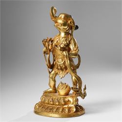 Tibetan gilt bronze figure of Ekadashamukha Avalokiteshvara, standing upright on lotus base, his primary hands in anjali mudra, the other six radiating to the sides, H28cm; together with a gilt bronze figure of Ganesh or Ganapati, H26cm (2)