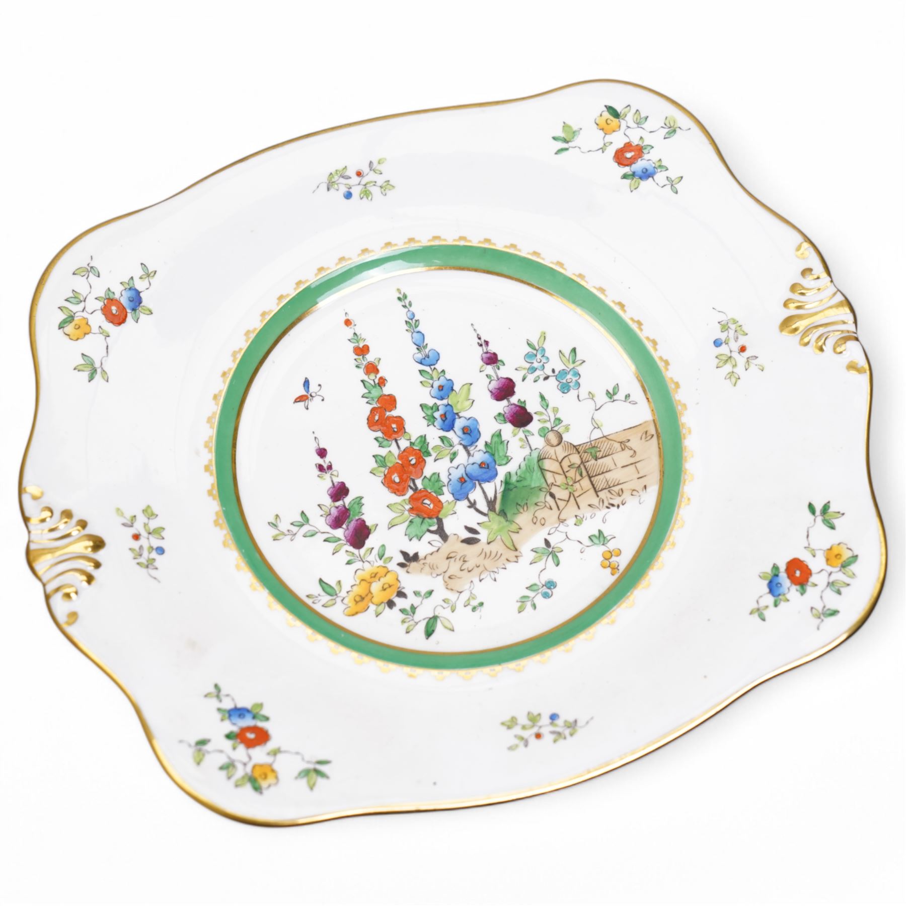 1930s Plant & Co Tuscan china tea set painted with flowers in blue, pink etc within a green border comprising twelve cups and saucers, twelve plates, two bread and butter plates, milk jug and sugar bowl (40)