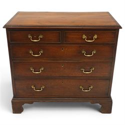 Late 18th century mahogany chest of drawers, rectangular top with moulded edge above two short and three long graduated drawers, with brass swan neck handles, shaped apron and bracket feet