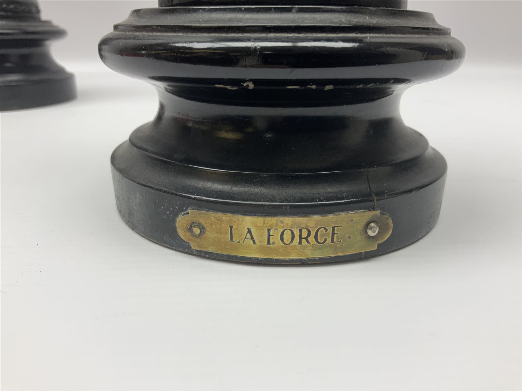 Pair of spelter figures, Le Force and Le Pouvoir, modeled as figures standing on lions, arms held aloft, H51cm 