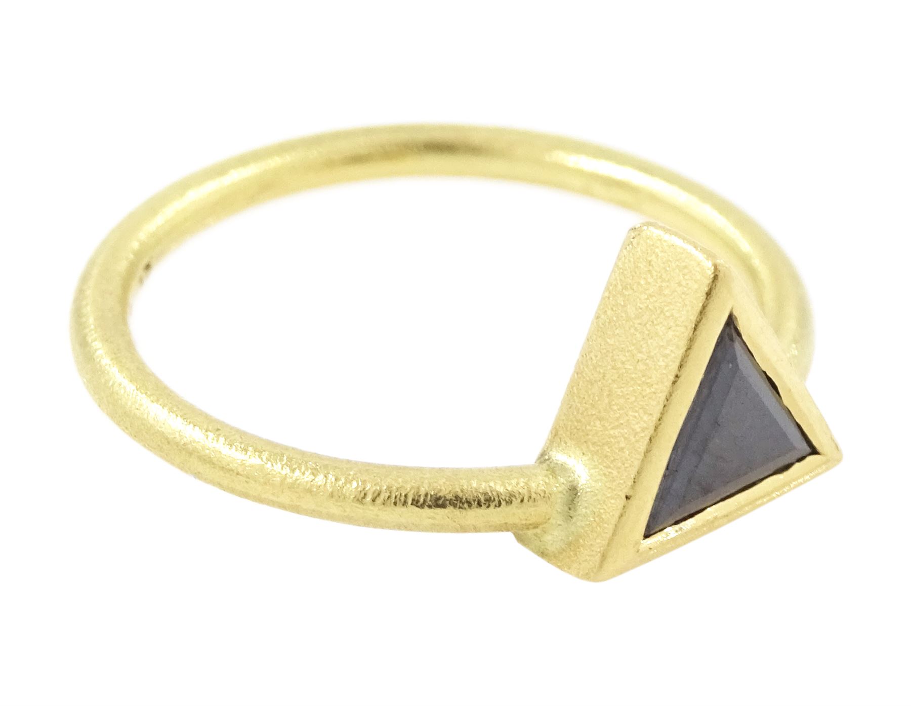 18ct gold black diamond ring, bezel set with a single trilliant cut diamond of approx 0.45 carat, stamped
