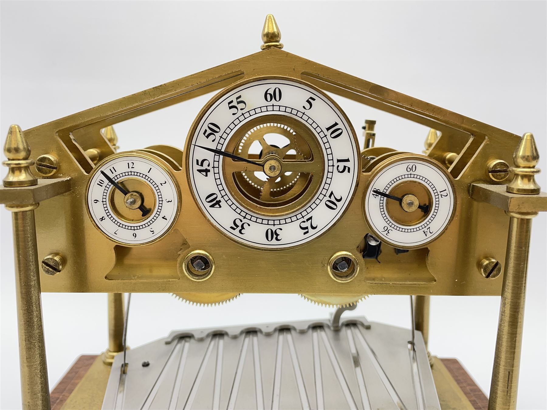 Mid 20th century 'Congreve' rolling ball clock, sloped arch and pierced