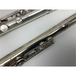 Boosey & Hawkes London Regent three-piece flute, serial no.345447; in B&H Bandhite hard carrying case; and Deg Music Company Inc. USA Claudel Model three-piece flute, serial no.491718, in hard carrying case (2)